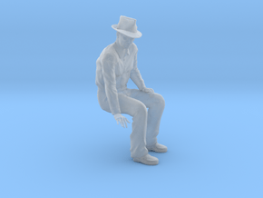 NG Fred sitting on bench wearing hat in Clear Ultra Fine Detail Plastic