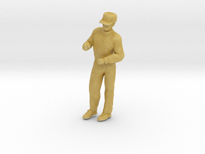 Man Standing Arms Bent: Wearing a Cap in Tan Fine Detail Plastic: 1:64 - S