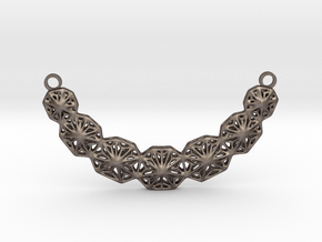 a necklace in Polished Bronzed-Silver Steel