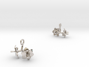 Earrings with two small flowers of the Amaryllis in Rhodium Plated Brass