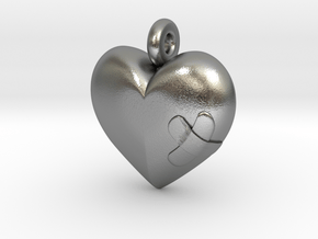 Wounded Heart Pendant in Natural Silver