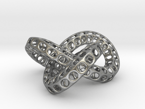 Triple Torus Knot in Natural Silver