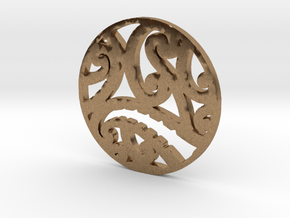 Maori koru tribal pendant design in Natural Brass