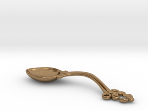 Spoon Alice in wonderland in Natural Brass