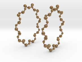 Molecule Big Hoop Earrings 60mm in Natural Brass