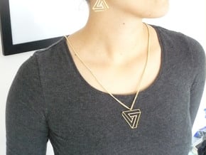 Impossible triangle pendant with a twist in Polished Brass