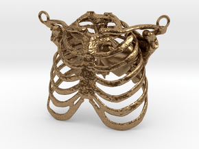 Ribcage With Stylized Heart Pendant in Natural Brass