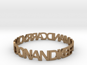 KEEP CALM AND CARRY ON AND ON AND bangle in Natural Brass