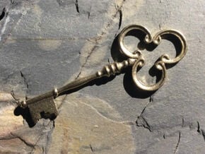 Clover Key in Natural Brass