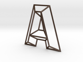 A Typolygon in Polished Bronze Steel