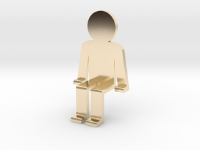 Person sitting in 14k Gold Plated Brass