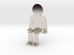 Person sitting in Rhodium Plated Brass