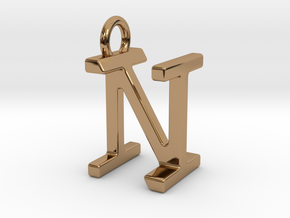 Two way letter pendant - IN NI in Polished Brass