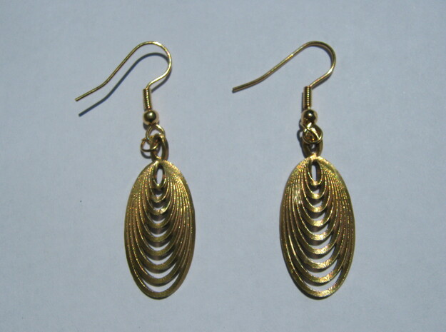 Nine Moebius Earrings in Natural Brass
