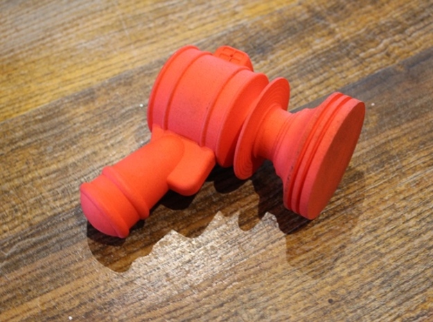 Robot Ray Gun Tamper in Red Processed Versatile Plastic