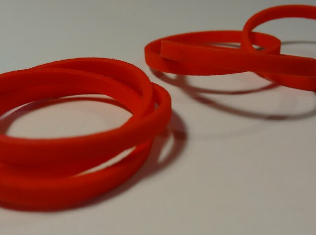 Three Circles in Red Processed Versatile Plastic