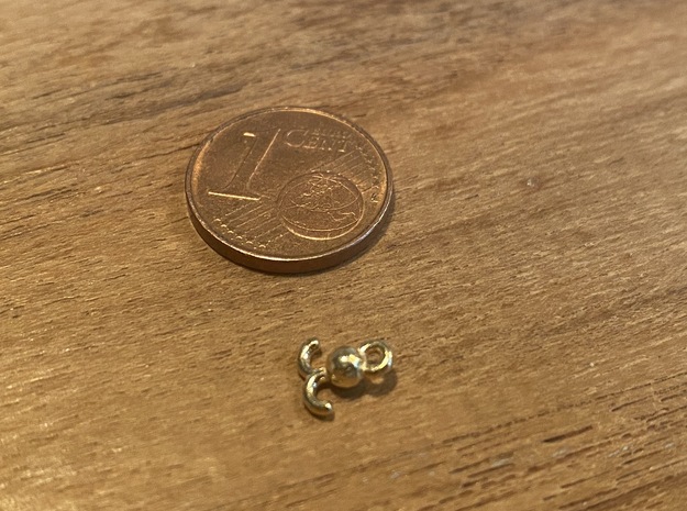 Hook with a weight for small cranes in Polished Brass