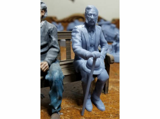 NG Gent Kalakaua sitting looking right in Smooth Fine Detail Plastic