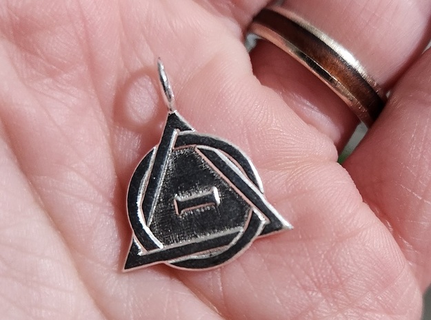 Theta-Delta Therian Charm in Natural Silver