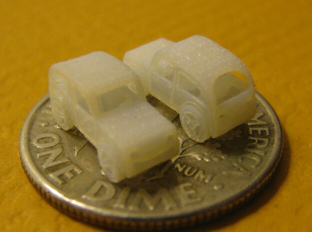 Pair of tiny micro cars with turning wheels in Tan Fine Detail Plastic