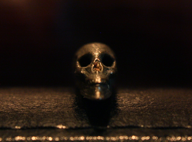 Hidden Anamorphic Skull Optical Illusion in Polished Bronzed Silver Steel