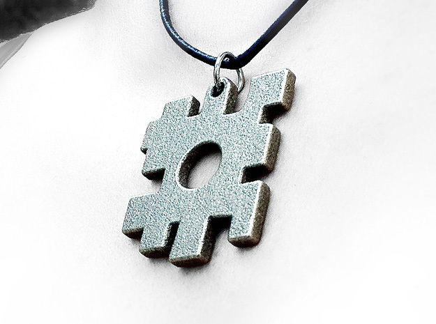 The missing piece pendant in Polished Bronzed Silver Steel