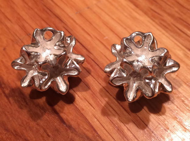 Imploded star earrings  in Polished Silver