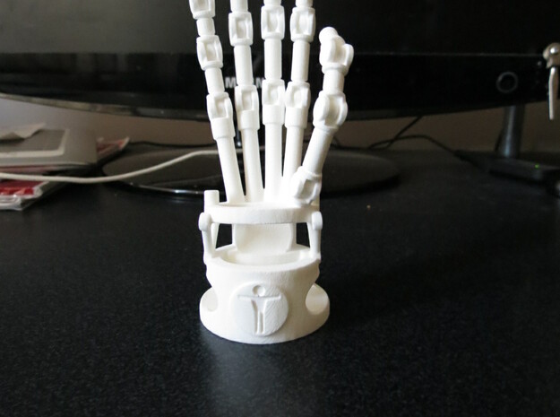 Robot hand phone stand in White Natural Versatile Plastic