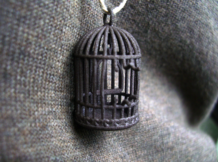Freedom Birdcage Pendant 3d printed Does not include a bird. It escaped. Obviously.