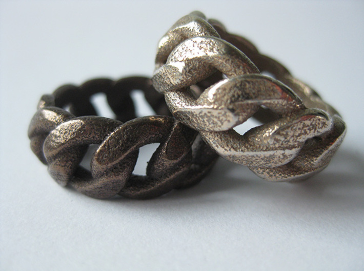 Chained Ring of Honor 3d printed - Chained Ring of Honor in Antique Bronze Glossy (left) and Stainless Steel (right) -