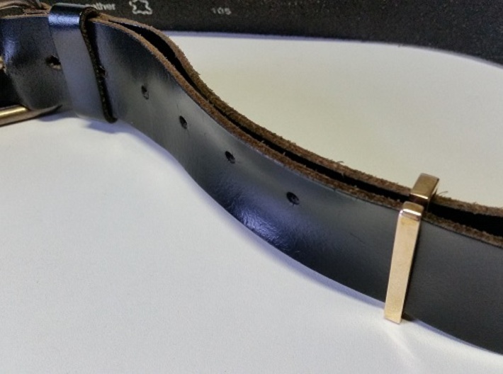 Belt clip, open. T41x4, shown: brass. 3d printed Belt clip 41x4, in polished brass, installed on belt