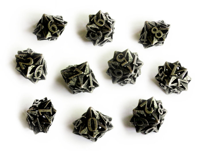 10d10 Pinwheel Set 3d printed In stainless steel and inked.