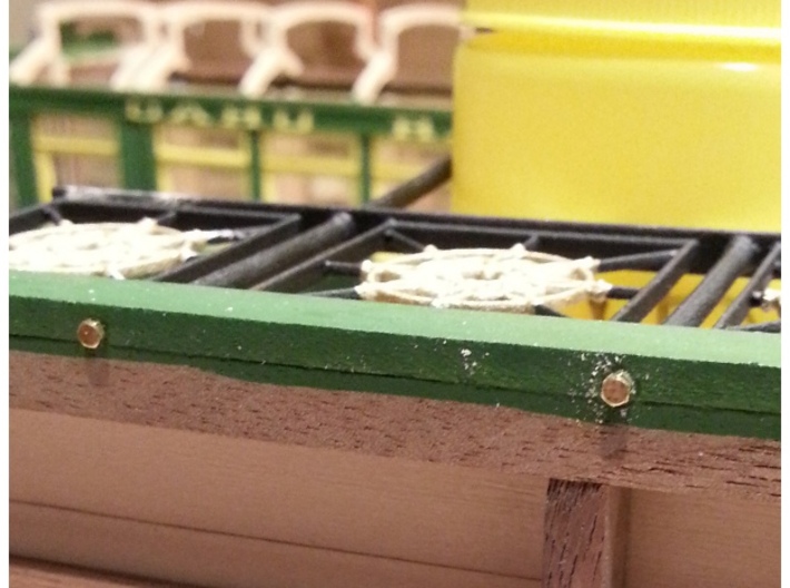 Observation Deck railing 1:20.32 scale 3d printed 00-90 bolts threaded into the polse through the deck facia.