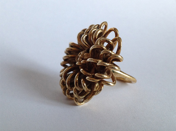 Ring 'Wiener Blume', Size 7.5 (Ø 17.7 mm) 3d printed 3D printed in 'Polished Brass'. Photographed with an Iphone 4S at daylight, no additional filters or lighting. The ring is a few months old and is starting to get a nice antique finish.