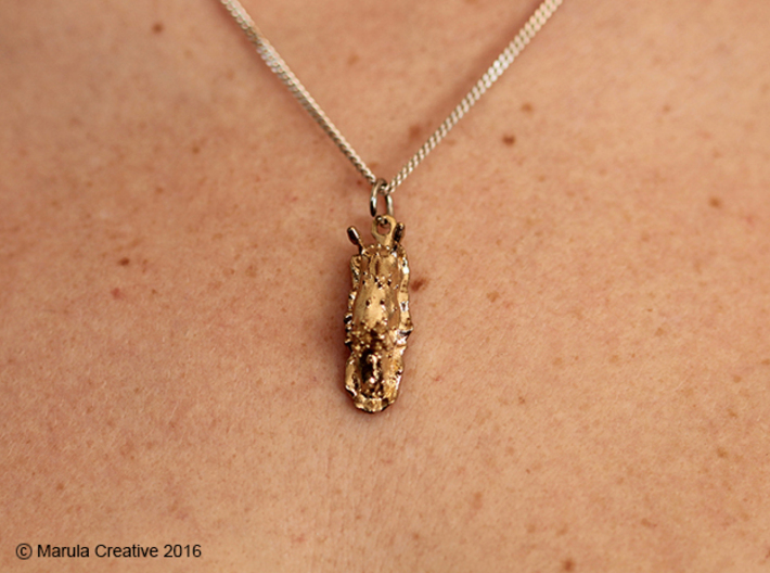 Doris the Nudibranch Pendant 3d printed Raw Brass pendant - showing chain with ring (not sold with product)