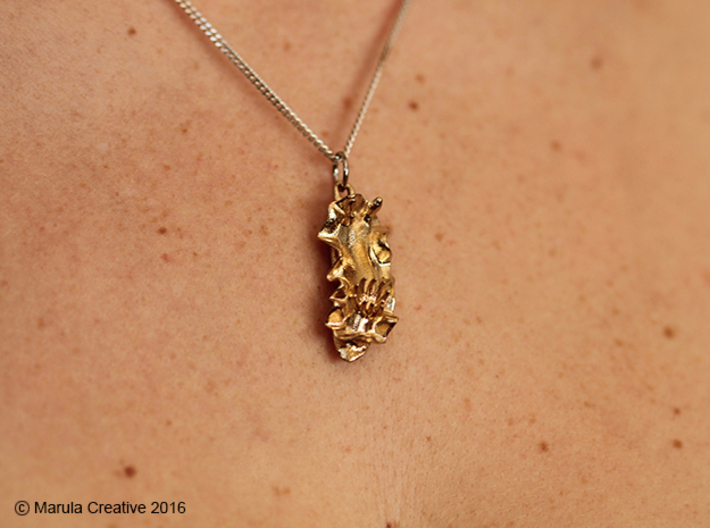 Becia the Nudibranch Pendant 3d printed Raw Brass pendant - showing chain with ring (not sold with product)