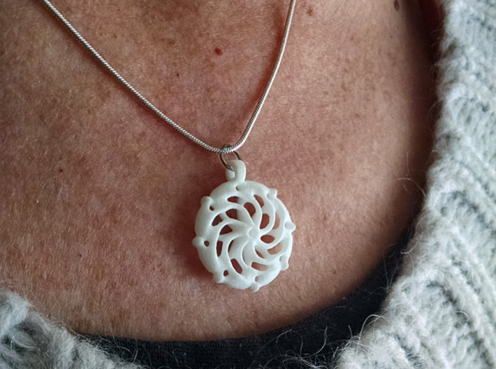 Vortex Mandala Pendant 3d printed Photo taken of White Strong Flexible Plastic Material