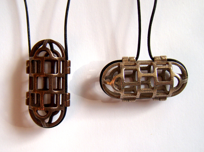 Pendant Cage 3d printed In Polished Bronze Steel and Stainless Steel