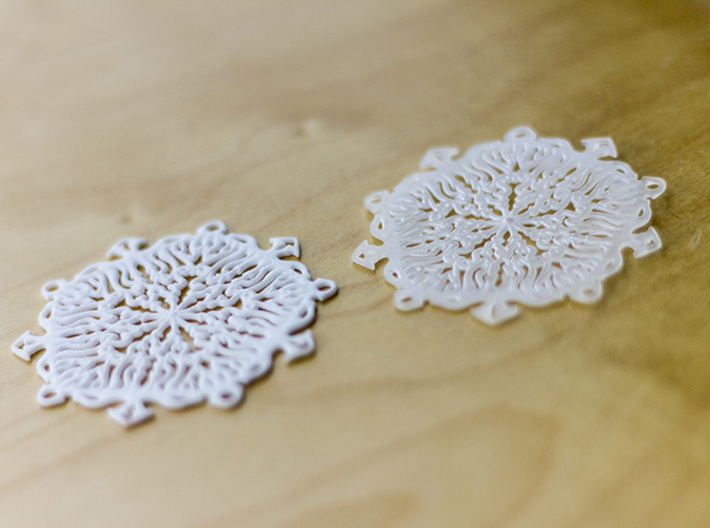 Snow Flake Earrings 3d printed Polished Strong &amp; Flexible (left), Ultra Fine Detailed (right)