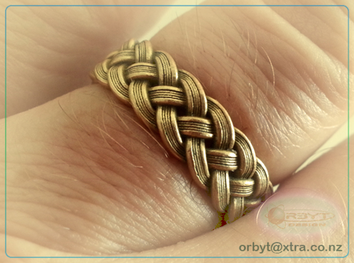 Best Celtic Knot Ring - US size 10 3d printed Smartphone camera pic of size 10 3D printed ring in raw brass material