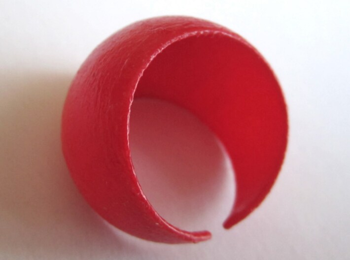 Sphere Ring v1 3d printed in Coral Red Strong and Flexible, and hand-varnished