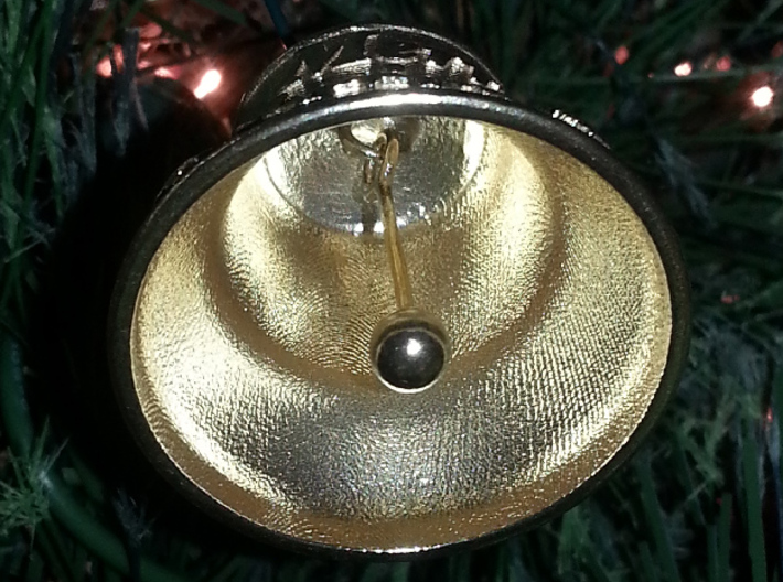 Merry Christmas Bell - Working Ringer Interlocking 3d printed A photo underside / inside in Raw Brass.