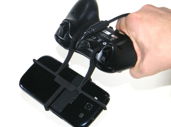 Controller mount for Xbox 360 & QMobile Noir LT250 3d printed In hand - A Samsung Galaxy S3 and a black Xbox 360 controller