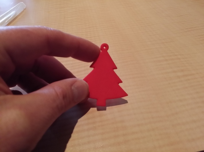 christmas tree ornament 3d printed Here is one in red so you can see the size in perspective.