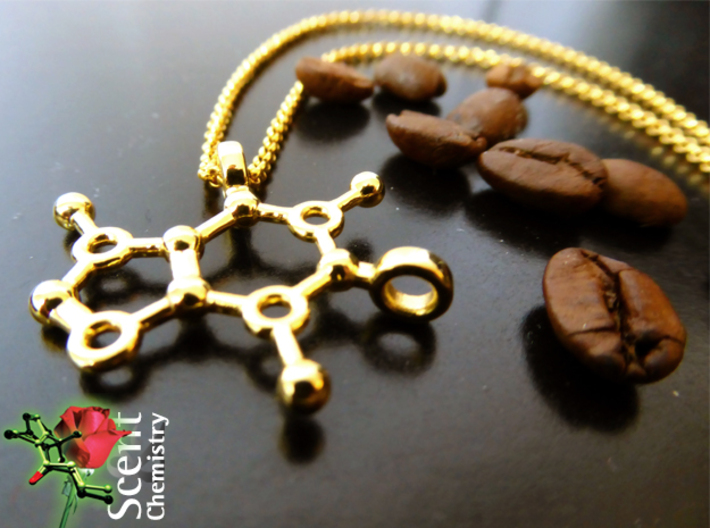 Caffeine 3d printed Caffeine pendant on an 18k gold-plated Thomas Sabo  KE1219-413-12-L42v necklace with a few freshly roasted coffee beans.