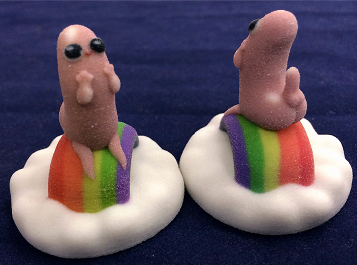 Dickbutt on a cloud of rainbows 3d printed Dickbutt printed in Full Color Sandstone