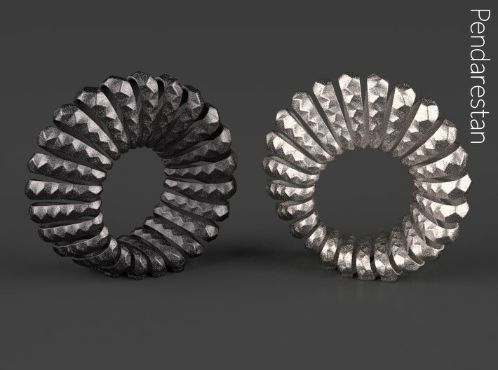 Mobelix 3d printed Mobelix I, fine art geometric sculpture of the Mobius strip, in Polished Grey Steel (left)
