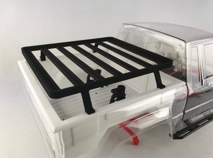 FR10018 SR5 Slimline II Bed Rack 6.0 x 6.5 3d printed PLEASE NOTE: This rack is compatable with the stock Pro-Line SR5 tray and the Knight Customs Sr510011 SR5 Bed Liner (sold separately).