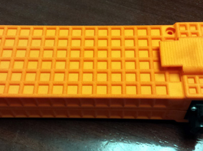 Surveying external battery LiPo Case 3d printed Dyed orange with Geodimeter plates in