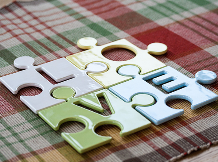 Puzzle Piece O - "Love-letters" 3d printed 4 puzzle pieces combined to write the word "love".